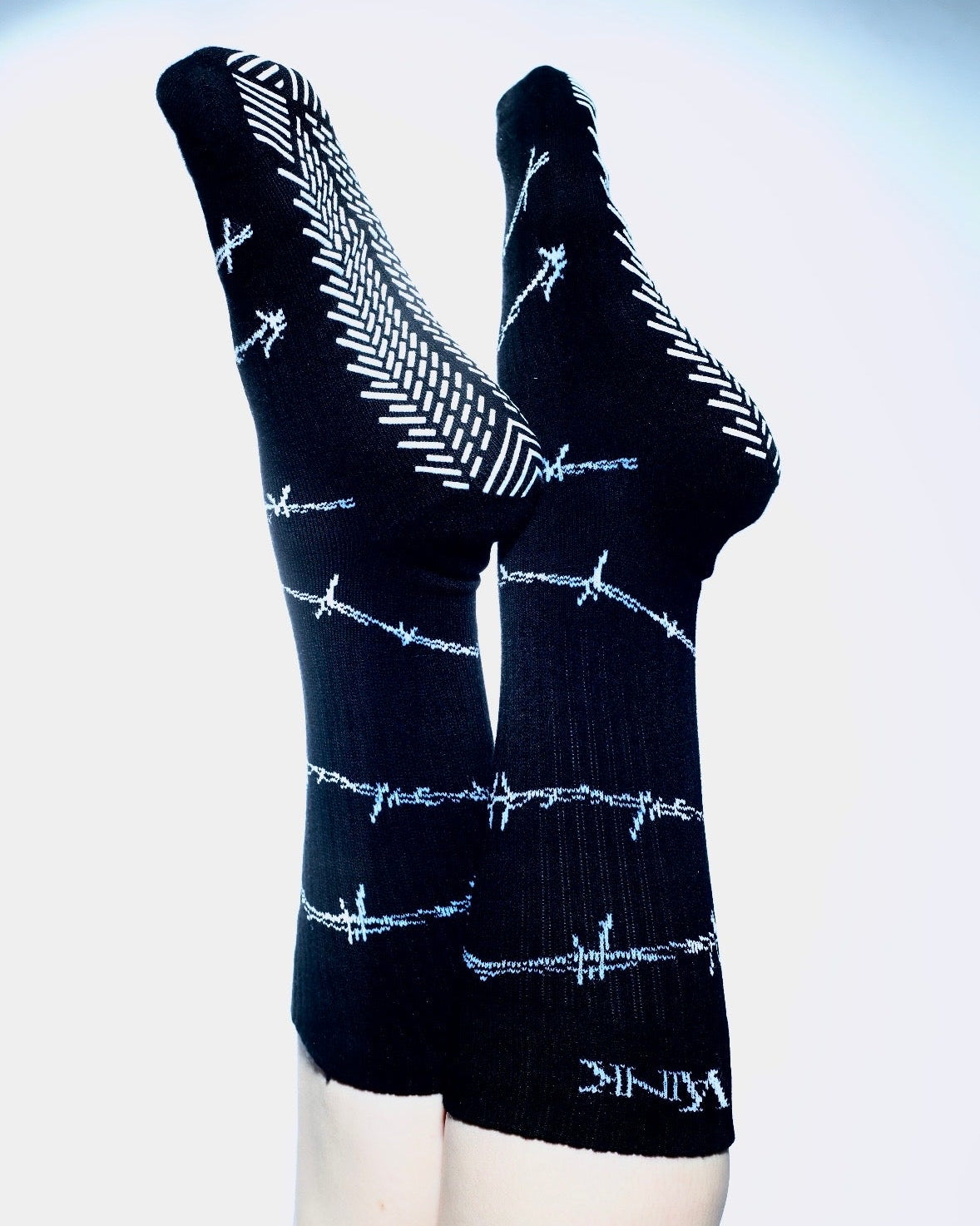black grip socks with barbed wire print